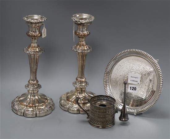 A pair of Old Sheffield plate candlesticks, a plated waiter and a pierced plated chamberstick, candlesticks height 29.5cm